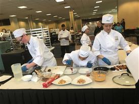 Culinary students in kitchen 